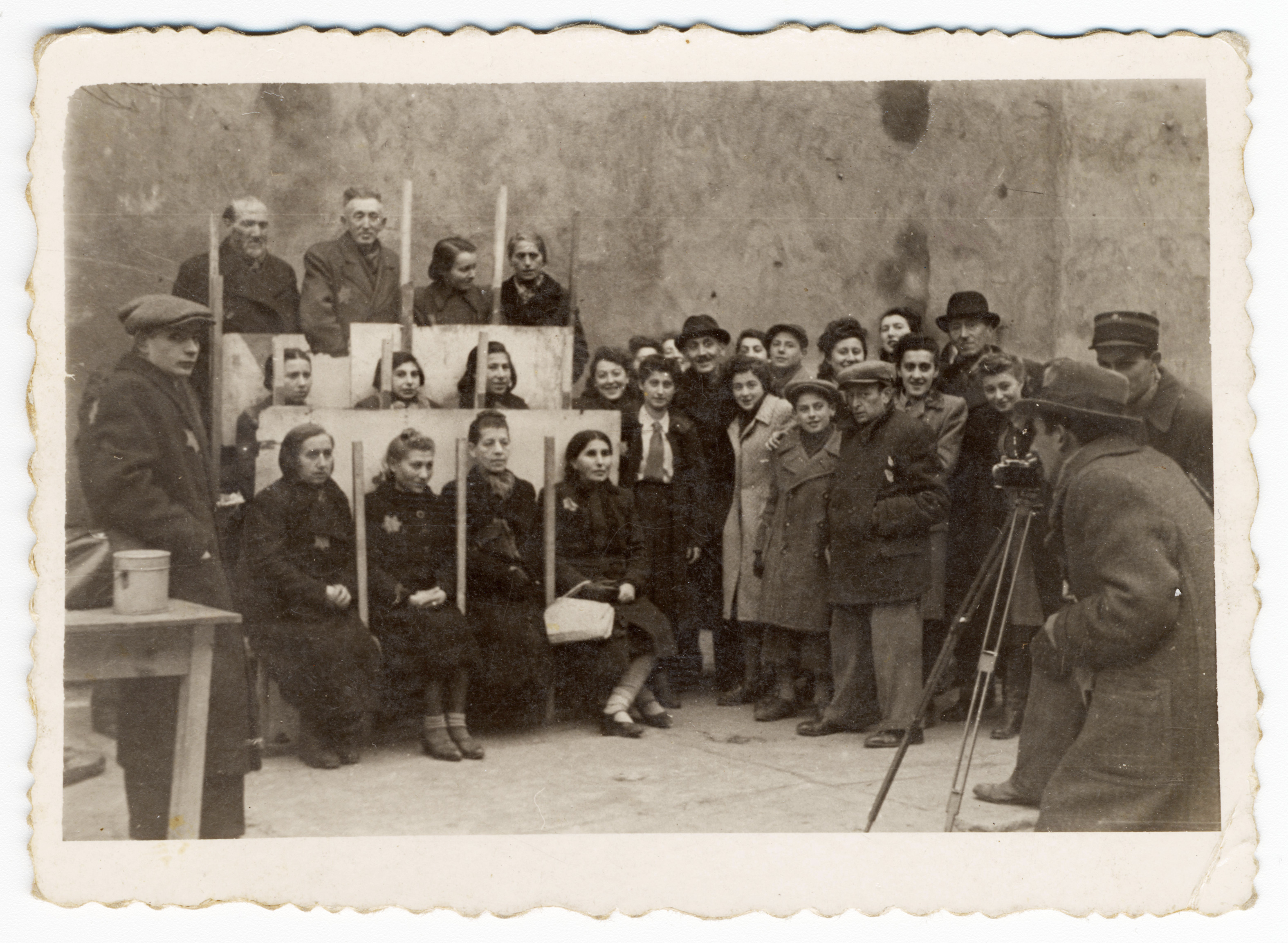 Henryk Ross photographing for identification cards, Jewish Administration, Statistics Department, 1940. Henryk Ross photographing for identification cards, Jewish Administration, Statistics Department, 1940.